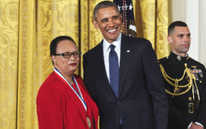 Shirley Ann Jackson standing beside President Barack Obama. She is wearing the National Medal of Science around her neck.