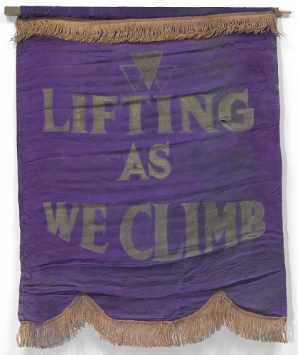 Purple flag that says Lifting as we climb.